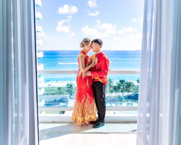 Couple on an oceanfront balcony